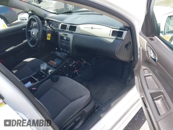 2013 Chevrolet Impala Police с VIN 2G1WD5E35D1166015, выставлен на аукционе IAAI как лот 42171708 с пробегом 169 790 миль миль и . История ставок и продаж доступна на DreamBid. Изображение 5.