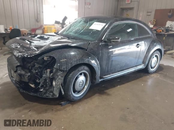 ✅ 2015 Volkswagen Beetle Fleet Edition • VIN: 3VWF17ATXFM654998 • Lot: 41569970. Listed on IAAI with 76,265 mi. Free auction sales archive from the USA and detailed vehicle history report at DreamBid. Image 2.