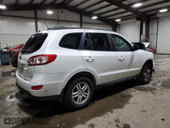 ✅ 2012 Hyundai Santa Fe GLS • VIN: 5XYZGDAB7CG123495 • Lot: 81838804. Listed on Copart with 145,621 mi. Free auction sales archive from the USA and detailed vehicle history report at DreamBid. Image 3.
