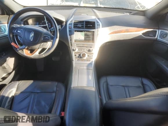 ✅ 2018 Lincoln MKZ Hybrid Reserve • VIN: 3LN6L5MU0JR621053 • Лот: 76517974. Опубликован ранее на Copart с пробегом 119 086 миль. Бесплатный доступ к архиву аукционных продаж из США и подробный отчёт об истории автомобиля на DreamBid. Изображение 8.