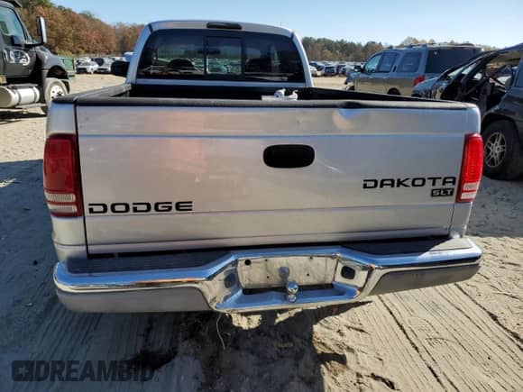 2003 Dodge Dakota SLT with VIN 1D7HL42N53S266476, listed as a Copart auction lot 79446004 with 139,911 mi miles and Salvage title. Bid and sale history available at DreamBid. Image 6.