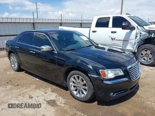 ✅ 2012 Chrysler 300 C • VIN: 2C3CCAET8CH309247 • Lot: 42460648. Listed on IAAI with 121,168 mi. Free auction sales archive from the USA and detailed vehicle history report at DreamBid. Image 1.