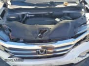 ✅ 2017 Honda Pilot EX-L • VIN: 5FNYF6H59HB051627 • Lot: 87286775. Listed on Copart with 104,700 mi. Free auction sales archive from the USA and detailed vehicle history report at DreamBid. Image 12.