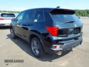 ✅ 2023 Honda Passport EX-L • VIN: 5FNYF8H51PB009494 • Lot: 42751895. Listed on IAAI with 24,085 mi. Free auction sales archive from the USA and detailed vehicle history report at DreamBid. Image 3.