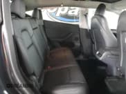 ✅ 2025 Tesla Model Y Long Range • VIN: 7SAYGDED0SF267132 • Lot: 84027995. Listed on Copart with 14,878 mi. Free auction sales archive from the USA and detailed vehicle history report at DreamBid. Image 10.