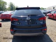 ✅ 2017 Hyundai Santa Fe 2.4L • VIN: 5XYZUDLB0HG458241 • Лот: 63053374. Опубликован ранее на Copart с пробегом Не указан. Бесплатный доступ к архиву аукционных продаж из США и подробный отчёт об истории автомобиля на DreamBid. Изображение 6.