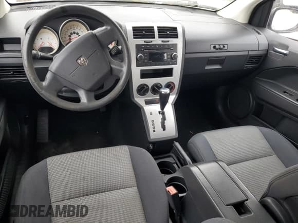 ✅ 2009 Dodge Caliber SXT • VIN: 1B3HB48A49D157720 • Лот: 86826154. Опубликован ранее на Copart с пробегом Не указан. Бесплатный доступ к архиву аукционных продаж из США и подробный отчёт об истории автомобиля на DreamBid. Изображение 8.