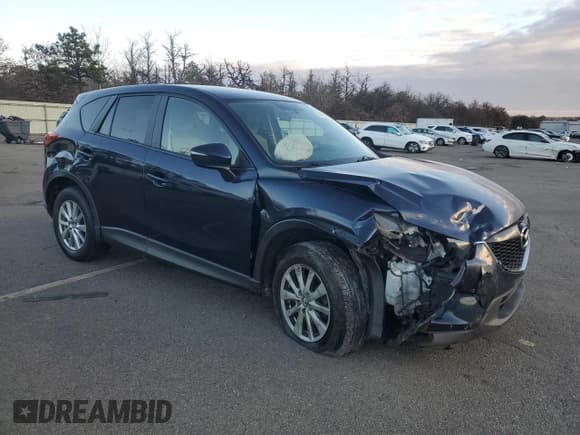 ✅ 2015 Mazda CX-5 Touring • VIN: JM3KE4CY3F0529851 • Lot: 93487675. Listed on Copart with 160,504 mi. Free auction sales archive from the USA and detailed vehicle history report at DreamBid. Image 4.