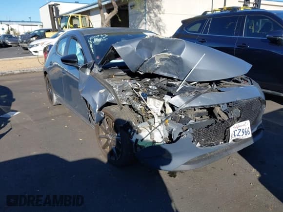 ✅ 2023 Mazda 3 S Preferred • VIN: JM1BPALM3P1610780 • Лот: 43460864. Опубликован ранее на IAAI с пробегом Не указан. Бесплатный доступ к архиву аукционных продаж из США и подробный отчёт об истории автомобиля на DreamBid. Изображение 1.