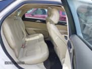 ✅ 2013 Lincoln MKZ Hybrid • VIN: 3LN6L2LU6DR807667 • Lot: 42533419. Wystawiony na IAAI z przebiegiem 90 327 mil. Bezpłatny archiwum sprzedaży aukcyjnych z USA i szczegółowy raport historii pojazdu na DreamBid. Zdjęcie 8.