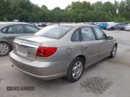 ✅ 2003 Saturn LS • VIN: 1G8JU54F23Y579397 • Lot: 43062943. Listed on IAAI with 184,144 mi. Free auction sales archive from the USA and detailed vehicle history report at DreamBid. Image 4.