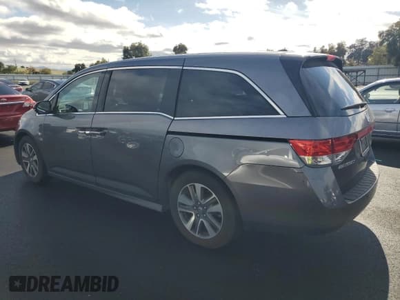 ✅ 2014 Honda Odyssey Touring • VIN: 5FNRL5H9XEB044496 • Lot: 91230885. Listed on Copart with 146,247 mi. Free auction sales archive from the USA and detailed vehicle history report at DreamBid. Image 2.
