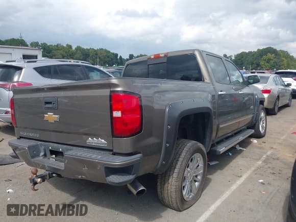 ✅ 2014 Chevrolet Silverado 1500 High Country • VIN: 3GCPCTEC7EG535811 • Lot: 43318821. Listed on IAAI with 170,885 mi. Free auction sales archive from the USA and detailed vehicle history report at DreamBid. Image 4.