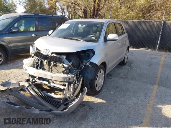 ✅ 2009 Scion xD • VIN: JTKKU10479J035365 • Lot: 43609235. Listed on IAAI with 142,836 mi. Free auction sales archive from the USA and detailed vehicle history report at DreamBid. Image 2.