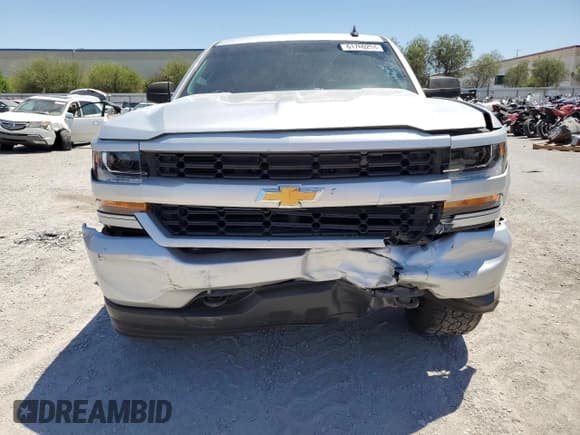 ✅ 2018 Chevrolet Silverado 1500 Custom • VIN: 3GCPCPEC3JG410015 • Лот: 61760294. Опубликован ранее на Copart с пробегом 55 293 миль. Бесплатный доступ к архиву аукционных продаж из США и подробный отчёт об истории автомобиля на DreamBid. Изображение 5.