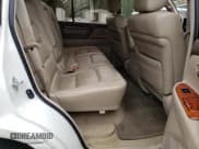 ✅ 2000 Lexus LX 470 • VIN: JT6HT00W6Y0077151 • Lot: 70678424. Wystawiony na Copart z przebiegiem 289 698 mil. Bezpłatny archiwum sprzedaży aukcyjnych z USA i szczegółowy raport historii pojazdu na DreamBid. Zdjęcie 11.