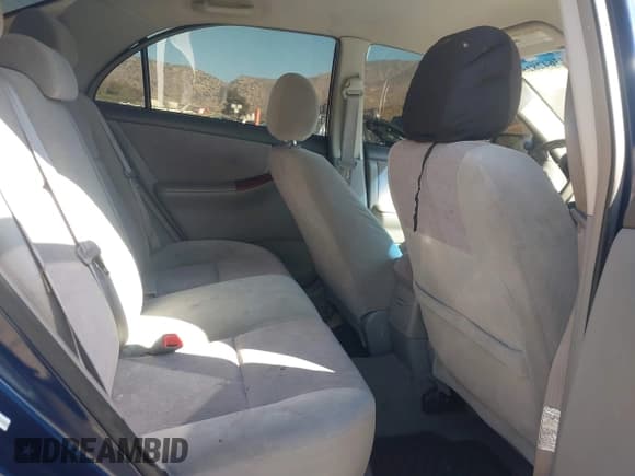 ✅ 2007 Toyota Corolla CE • VIN: 1NXBR32E27Z802038 • Lot: 43642825. Listed on IAAI with 299,999 mi. Free auction sales archive from the USA and detailed vehicle history report at DreamBid. Image 8.