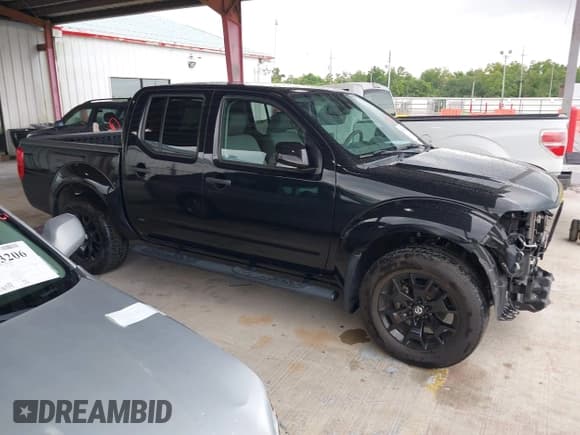 ✅ 2020 Nissan Frontier Pro-4X • VIN: 1N6ED0EB7LN702647 • Lot: 42319424. Listed on IAAI with 65,267 mi. Free auction sales archive from the USA and detailed vehicle history report at DreamBid. Image 14.