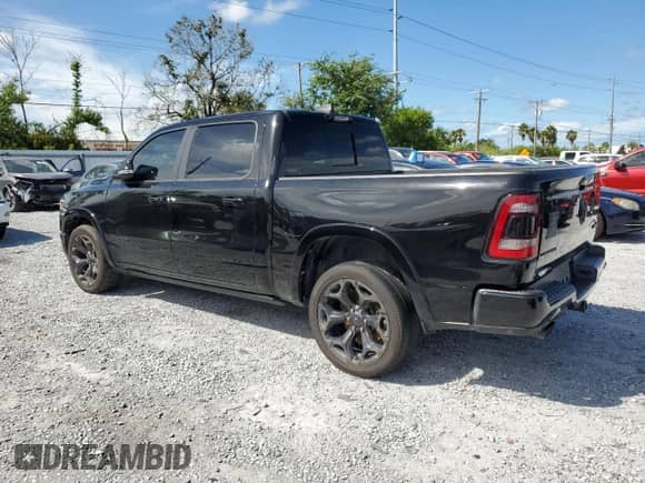 2021 Ram 1500 Limited with VIN 1C6SRFHT3MN561003, listed as a Copart auction lot 71165905 with Not provided miles and Salvage title. Bid and sale history available at DreamBid. Image 2.