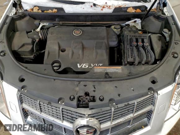 ✅ 2012 Cadillac SRX Premium Collection • VIN: 3GYFNCE39CS561384 • Lot: 96707565. Wystawiony na Copart z przebiegiem 180 316 mil. Bezpłatny archiwum sprzedaży aukcyjnych z USA i szczegółowy raport historii pojazdu na DreamBid. Zdjęcie 12.