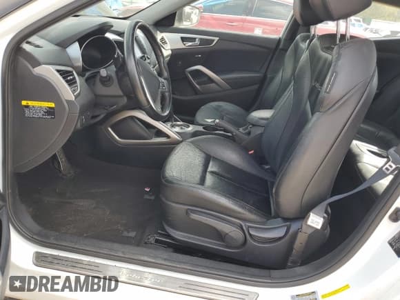 ✅ 2014 Hyundai Veloster • VIN: KMHTC6AD5EU213773 • Lot: 74619554. Wystawiony na Copart z przebiegiem 98 315 mil. Bezpłatny archiwum sprzedaży aukcyjnych z USA i szczegółowy raport historii pojazdu na DreamBid. Zdjęcie 7.