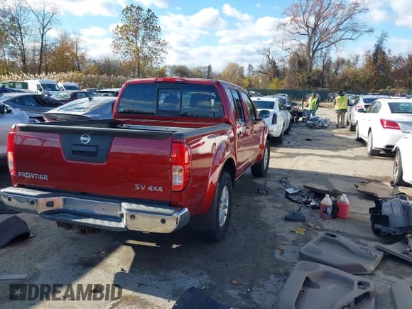 ✅ 2014 Nissan Frontier Pro-4X • VIN: 1N6AD0EV6EN719239 • Lot: 43665704. Listed on IAAI with 132,038 mi. Free auction sales archive from the USA and detailed vehicle history report at DreamBid. Image 4.