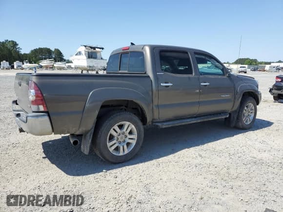 ✅ 2015 Toyota Tacoma • VIN: 3TMLU4EN3FM200857 • Lot: 53662445. Listed on Copart with 99,782 mi. Free auction sales archive from the USA and detailed vehicle history report at DreamBid. Image 3.
