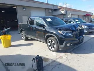 ✅ 2020 Honda Ridgeline RTL • VIN: 5FPYK3F59LB023212 • Lot: 40704228. Wystawiony na IAAI z przebiegiem 73 259 mil. Bezpłatny archiwum sprzedaży aukcyjnych z USA i szczegółowy raport historii pojazdu na DreamBid. Zdjęcie 1.