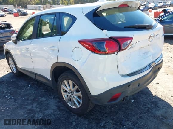 ✅ 2016 Mazda CX-5 Sport • VIN: JM3KE2BY1G0691999 • Lot: 43459714. Wystawiony na IAAI z przebiegiem 392 475 mil. Bezpłatny archiwum sprzedaży aukcyjnych z USA i szczegółowy raport historii pojazdu na DreamBid. Zdjęcie 3.