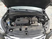 ✅ 2018 Hyundai Santa Fe 2.0T • VIN: 5NMZU4LA7JH082656 • Лот: 50277193. Опубликован ранее на Copart с пробегом 61 670 миль. Бесплатный доступ к архиву аукционных продаж из США и подробный отчёт об истории автомобиля на DreamBid. Изображение 12.