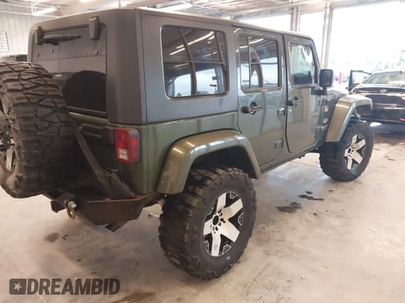 ✅ 2008 Jeep Wrangler Unlimited Sahara • VIN: 1J4GA59158L504309 • Lot: 43292936. Listed on IAAI with 147,545 mi. Free auction sales archive from the USA and detailed vehicle history report at DreamBid. Image 4.