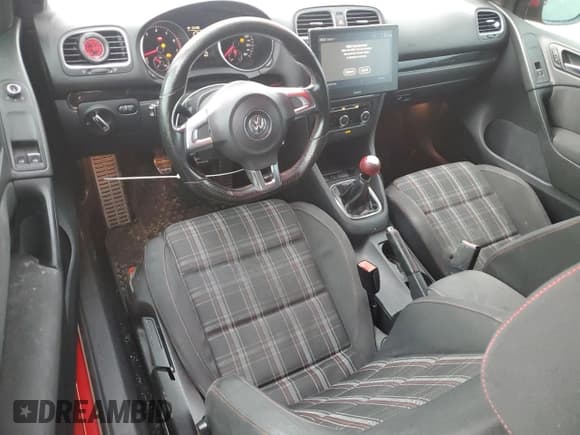 ✅ 2012 Volkswagen Golf GTI w/Conv & Sunroof • VIN: WVWEV7AJ7CW178142 • Lot: 61077795. Listed on Copart with 148,601 mi. Free auction sales archive from the USA and detailed vehicle history report at DreamBid. Image 8.