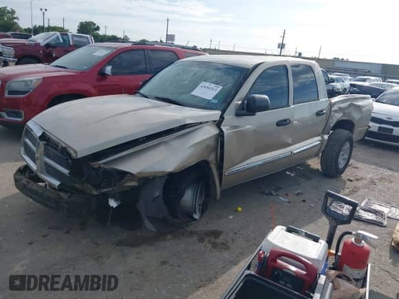 2005 Dodge Dakota Laramie с VIN 1D7HE58N25S202907, выставлен на аукционе IAAI как лот 42654313 с пробегом 245 284 миль миль и . История ставок и продаж доступна на DreamBid. Изображение 2.