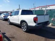 ✅ 2019 Honda Ridgeline RTL • VIN: 5FPYK2F5XKB004418 • Lot: 41662015. Listed on IAAI with 69,994 mi. Free auction sales archive from the USA and detailed vehicle history report at DreamBid. Image 3.