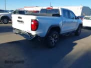 ✅ 2024 GMC Canyon 4WD AT4 • VIN: 1GTP6DEK1R1144016 • Lot: 43282257. Listed on IAAI with 18,298 mi. Free auction sales archive from the USA and detailed vehicle history report at DreamBid. Image 4.