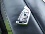 ✅ 2024 BMW 8 Series M850i • VIN: WBAGV8C09RCP31125 • Lot: 42333973. Listed on IAAI with 13,787 mi. Free auction sales archive from the USA and detailed vehicle history report at DreamBid. Image 11.