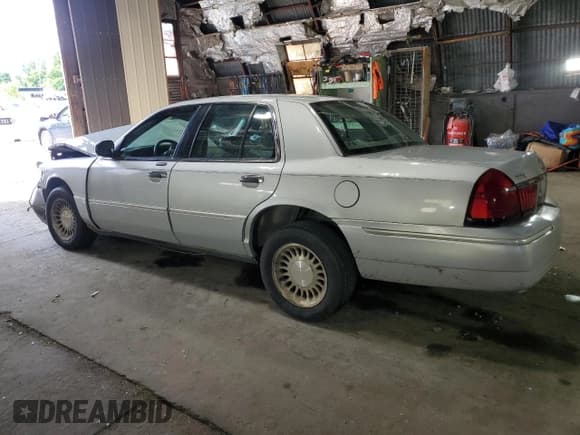 ✅ 2001 Mercury Grand Marquis LS • VIN: 2MEFM75W81X603977 • Лот: 64108865. Опубликован ранее на Copart с пробегом 187 153 миль. Бесплатный доступ к архиву аукционных продаж из США и подробный отчёт об истории автомобиля на DreamBid. Изображение 2.