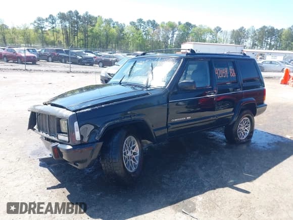 ✅ 1998 Jeep Cherokee Sport • VIN: 1J4FJ68S9WL124723 • Лот: 42054826. Опубликован ранее на IAAI с пробегом 232 706 миль. Бесплатный доступ к архиву аукционных продаж из США и подробный отчёт об истории автомобиля на DreamBid. Изображение 2.