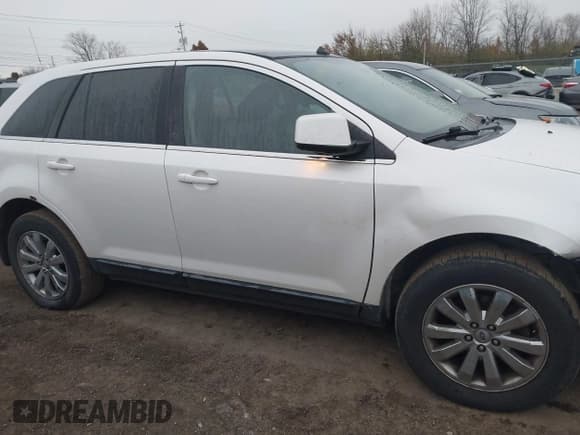 ✅ 2009 Ford Edge Limited • VIN: 2FMDK39C39BA88060 • Lot: 43721007. Listed on IAAI with 215,822 mi. Free auction sales archive from the USA and detailed vehicle history report at DreamBid. Image 13.