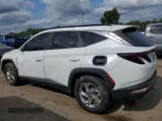 ✅ 2022 Hyundai Tucson SEL • VIN: 5NMJB3AE0NH004812 • Lot: 71742844. Wystawiony na Copart z przebiegiem 77 523 mil. Bezpłatny archiwum sprzedaży aukcyjnych z USA i szczegółowy raport historii pojazdu na DreamBid. Zdjęcie 2.