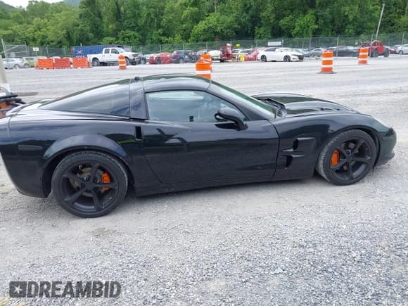 ✅ 2005 Chevrolet Corvette • VIN: 1G1YY24U255114220 • Lot: 42543444. Listed on IAAI with 77,448 mi. Free auction sales archive from the USA and detailed vehicle history report at DreamBid. Image 13.