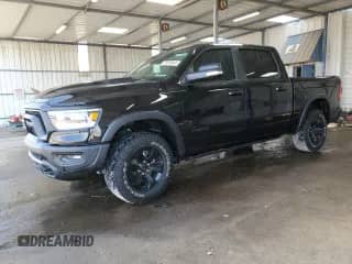 2021 Ram 1500 Rebel z VIN 1C6SRFLT3MN582327, wystawiony jako Copart lot #68369845 z przebiegiem 48 669 mil mil oraz Szkoda całkowita • Salvage title. Historia ofert i sprzedaży dostępna na DreamBid. Obrazek 1.