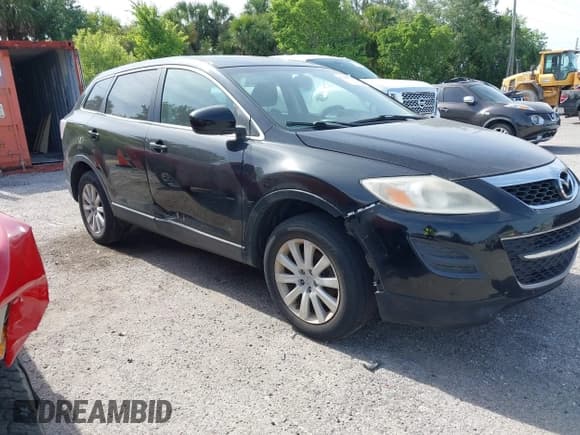 ✅ 2010 Mazda CX-9 Sport • VIN: JM3TB2MA7A0236918 • Lot: 42060510. Listed on IAAI with 201,690 mi. Free auction sales archive from the USA and detailed vehicle history report at DreamBid. Image 1.