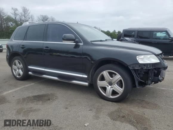 ✅ 2004 Volkswagen Touareg • VIN: WVGCC67LX4D001013 • Лот: 61066055. Опубликован ранее на Copart с пробегом 82 801 миль. Бесплатный доступ к архиву аукционных продаж из США и подробный отчёт об истории автомобиля на DreamBid. Изображение 4.