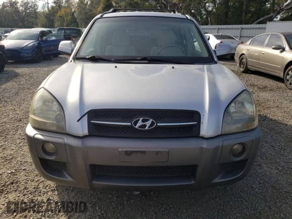 2006 Hyundai Tucson GLS z VIN KM8JN12D46U349221, wystawiony jako Copart lot #83877214 z przebiegiem 96 268 mil mil oraz Szkoda całkowita • Salvage title. Historia ofert i sprzedaży dostępna na DreamBid. Obrazek 5.