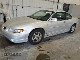 ✅ 2001 Pontiac Grand Prix GT • VIN: 1G2WP12K61F175091 • Lot: 71577405. Listed on Copart with 147,405 mi. Free auction sales archive from the USA and detailed vehicle history report at DreamBid. Image 1.