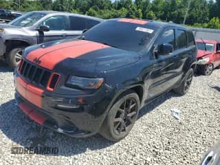 ✅ 2016 Jeep Grand Cherokee SRT • VIN: 1C4RJFDJ2GC457346 • Lot: 36821364. Wystawiony na Copart z przebiegiem 78 128 mil. Bezpłatny archiwum sprzedaży aukcyjnych z USA i szczegółowy raport historii pojazdu na DreamBid. Zdjęcie 1.