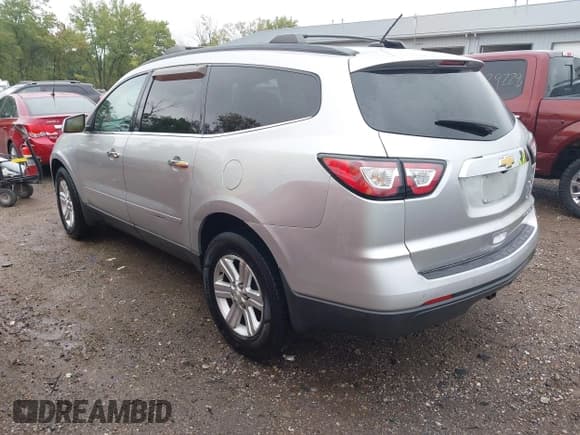 ✅ 2014 Chevrolet Traverse LT • VIN: 1GNKRHKD0EJ292318 • Lot: 43299923. Listed on IAAI with 135,449 mi. Free auction sales archive from the USA and detailed vehicle history report at DreamBid. Image 3.