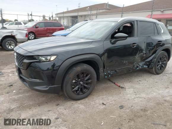 ✅ 2025 Mazda CX-50 S Premium • VIN: 7MMVABDM7SN334320 • Lot: 43597828. Listed on IAAI with 11,321 mi. Free auction sales archive from the USA and detailed vehicle history report at DreamBid. Image 17.