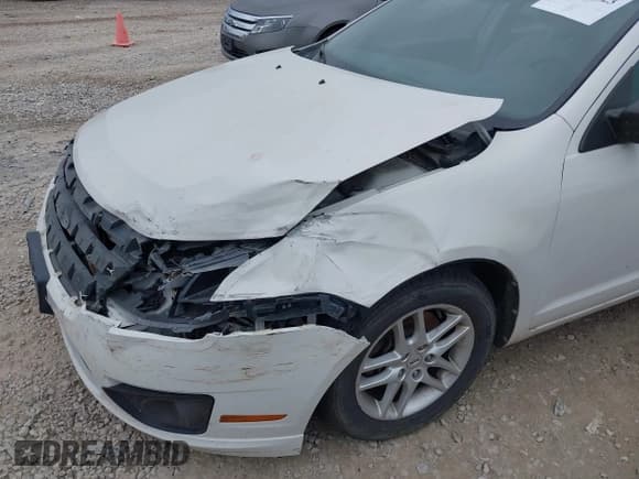 ✅ 2012 Ford Fusion S • VIN: 3FAHP0GA2CR445797 • Лот: 43499223. Опубликован ранее на IAAI с пробегом 91 346 миль. Бесплатный доступ к архиву аукционных продаж из США и подробный отчёт об истории автомобиля на DreamBid. Изображение 6.